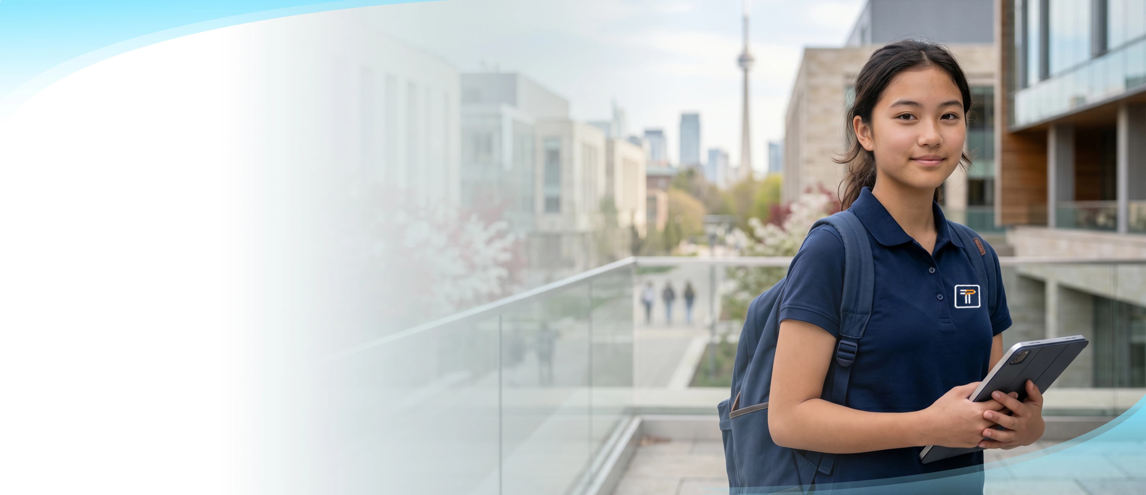 Female student holding a tablet on a university campus with the Toronto skyline and CN Tower in the background, representing Tutrain online education in Canada.